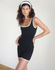 Image de l'unitard Amira en noir avec reliure blanche