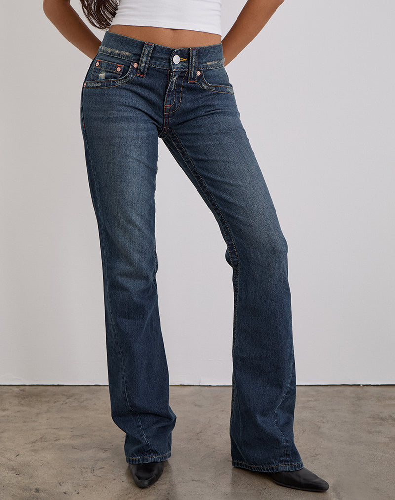 Jean taille basse à coutures torsadées, coloris bleu moyen