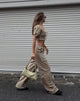 Image de MOTEL X JACQUIE Pantalon large Lirura à carreaux jaunes et bruns