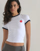 image de Salida Top en blanc avec reliure marine et motif de pomme