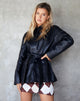 Image de la veste ceinturée en PU noir