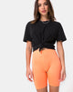 Image du short de cyclisme en orange fluo