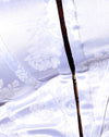 Flocage floral ton sur ton blanc