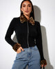Image de Loria Cardi en noir avec animal marron