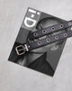 Image de la ceinture à œillet unique en cuir PU Noir