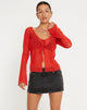 image de Sujata Cardi en rouge