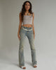Image de Jeans effilochés à taille basse en délavage léger Sandy Tint