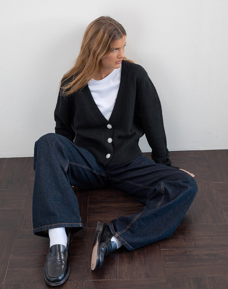Image de Acera Cardigan tricoté en noir avec boutons fleuris argentés