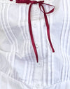 Popeline blanche avec bordure rouge
