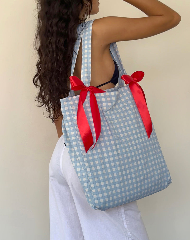 Image du sac Barbara en vichy bleu avec nœud rouge