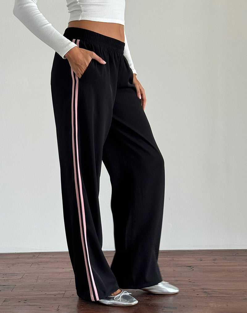 Pantalon Bennett en noir avec rayures latérales roses