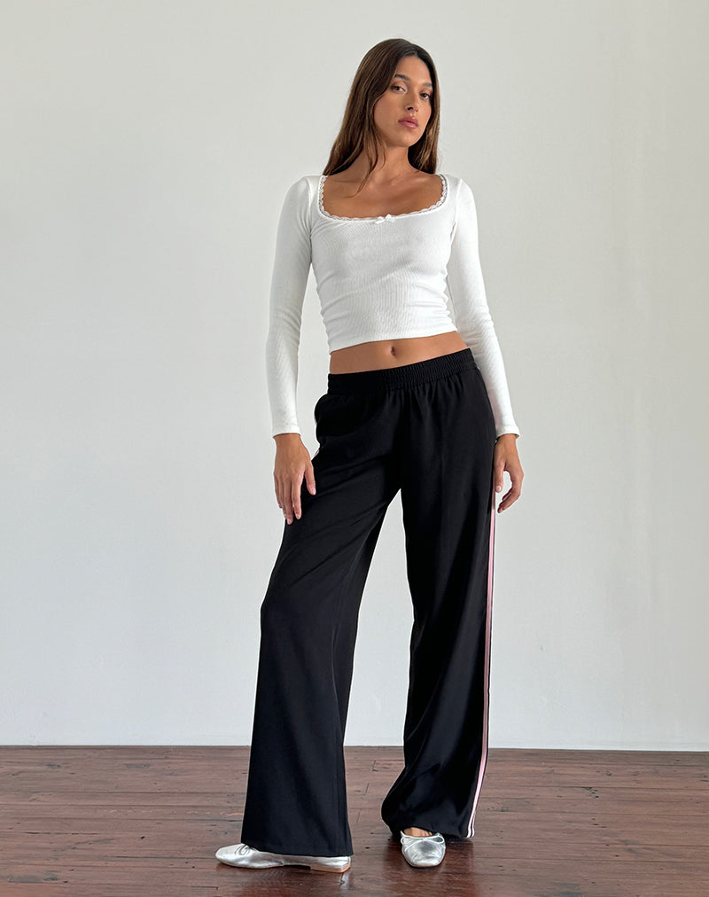 Pantalon Bennett en noir avec rayures latérales roses