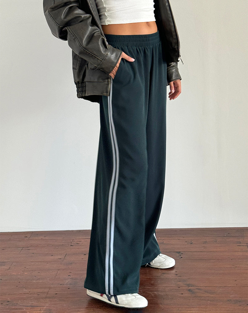 Pantalon Bennett en forêt avec rayures bleues