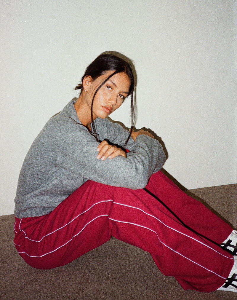 Image de Benton Jogger en rouge adrénaline avec fixation violette