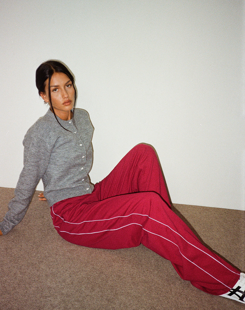 Image de Benton Jogger en rouge adrénaline avec fixation violette