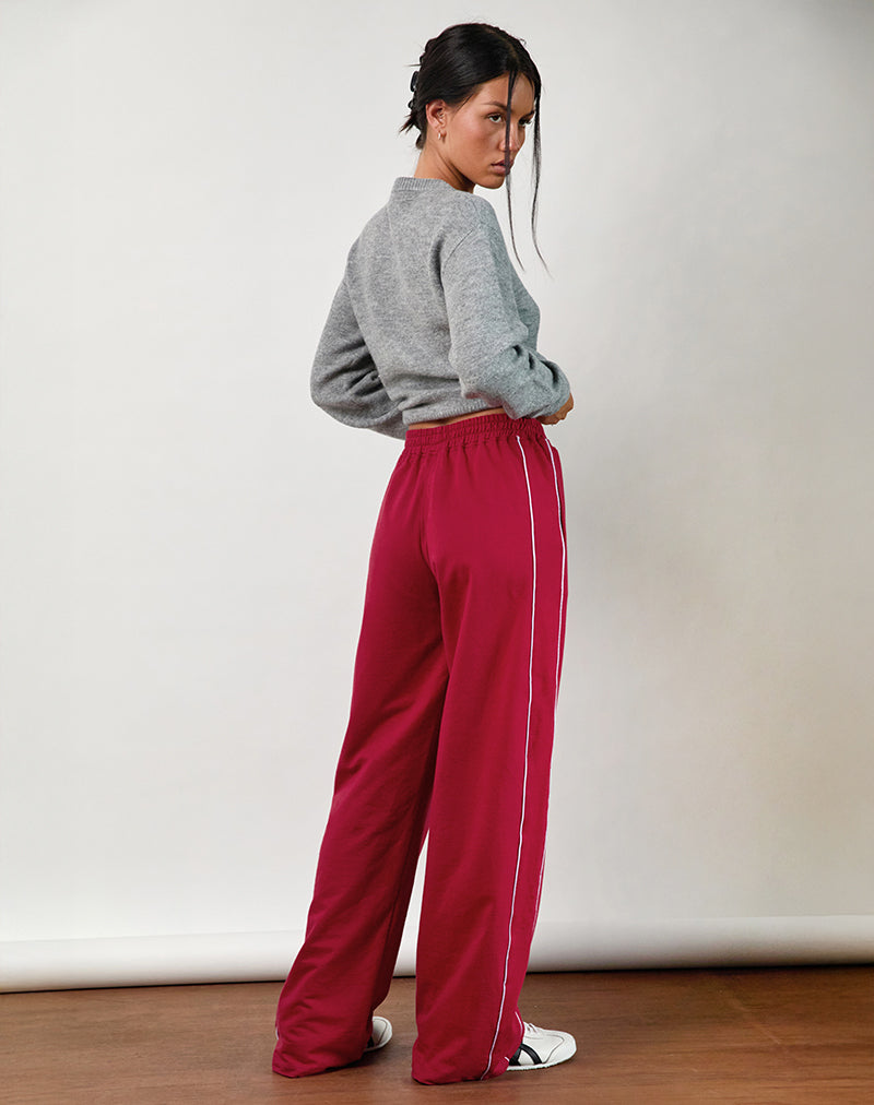 Image de Benton Jogger en rouge adrénaline avec fixation violette
