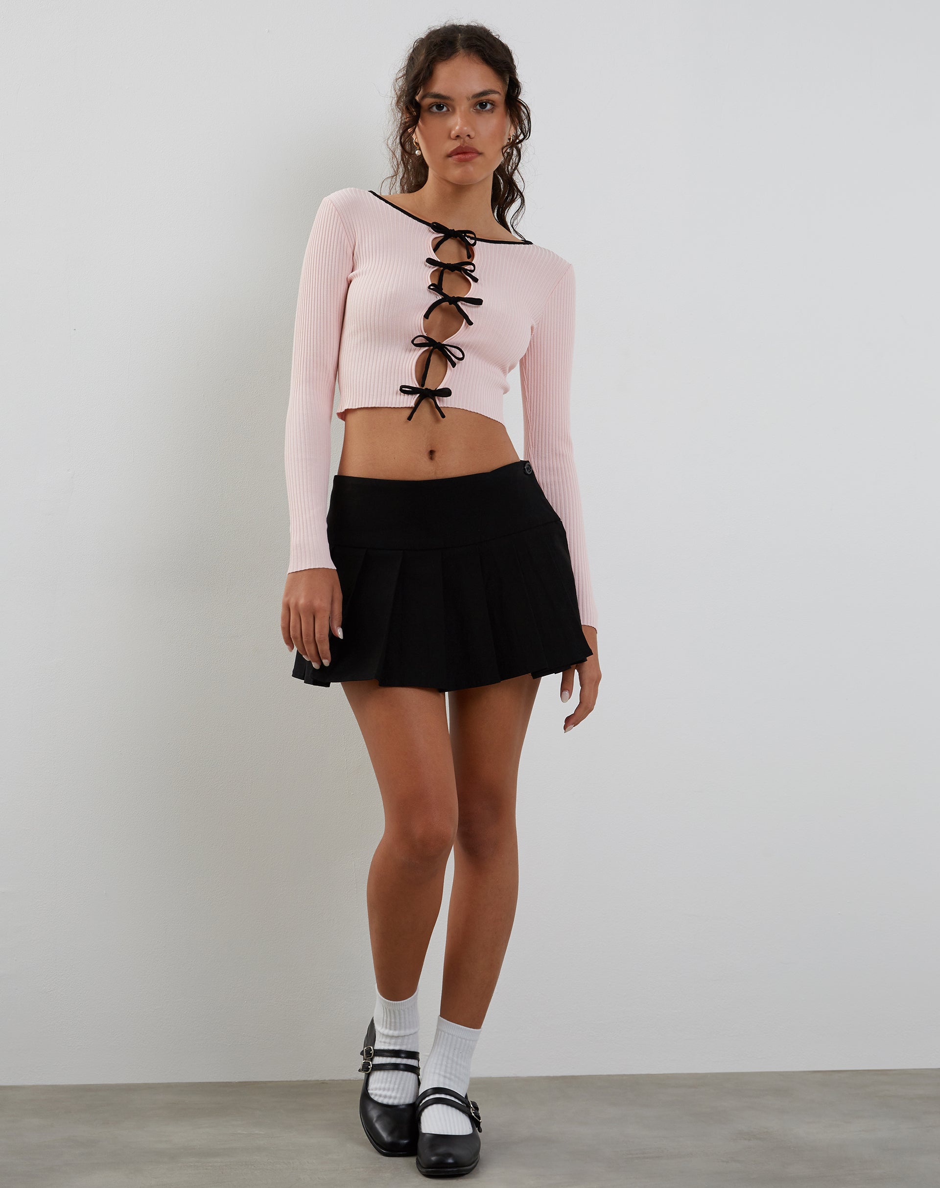 Image de Dipha Cardigan en rose blush avec nœuds noirs