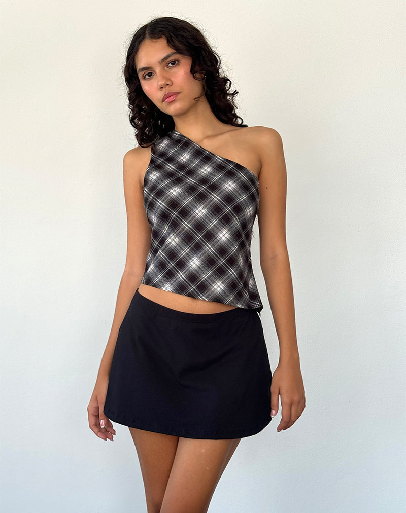 Top asymétrique Harini à carreaux noirs et blancs