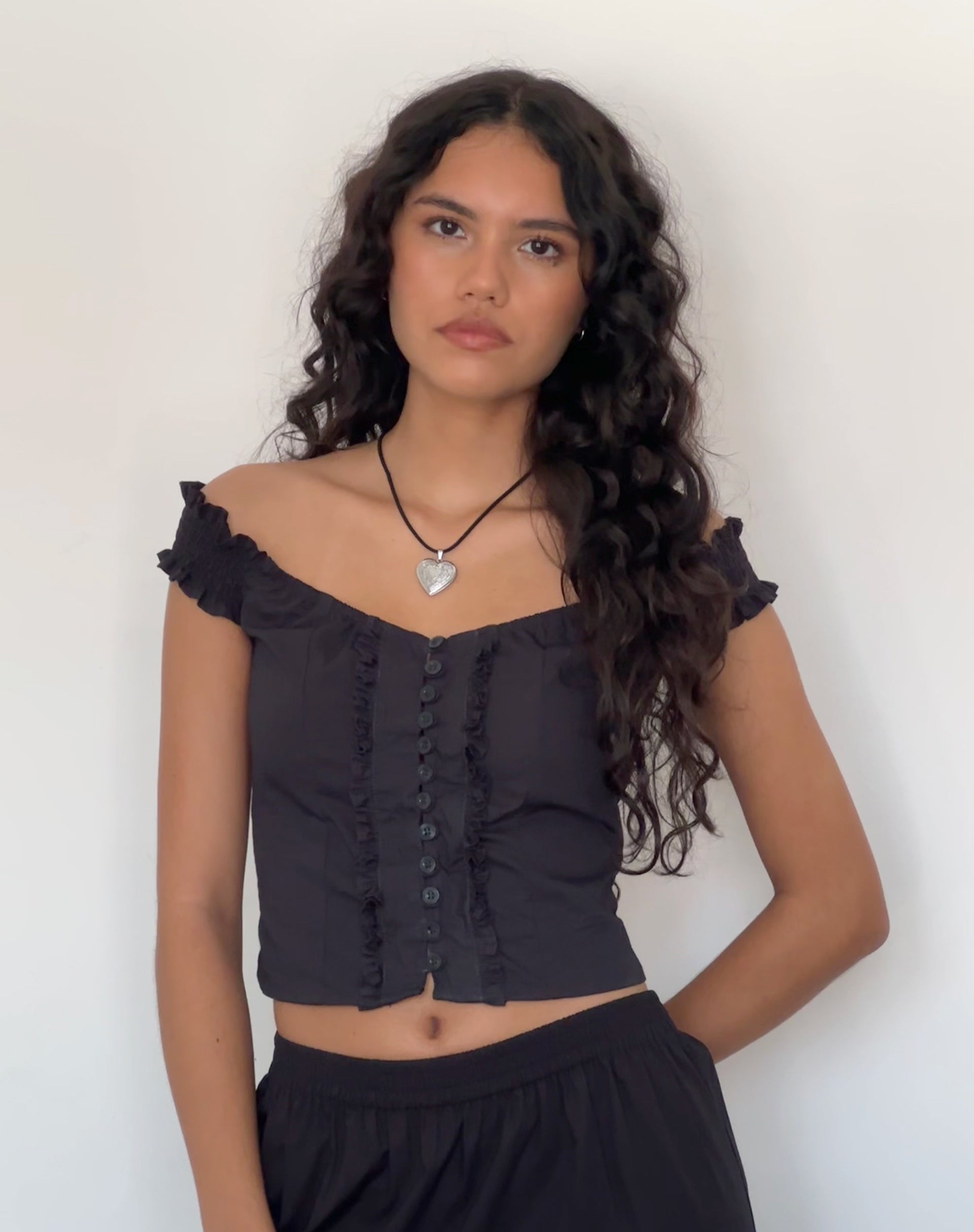 Image de marque du collier à pendentifs en forme de cœur en corde de Harley par Gemini Jewels
