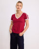 Image de Janan Top en rouge adrénaline avec fixation blanche