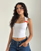 Image de Jiniso Top en blanc avec nœuds rouges