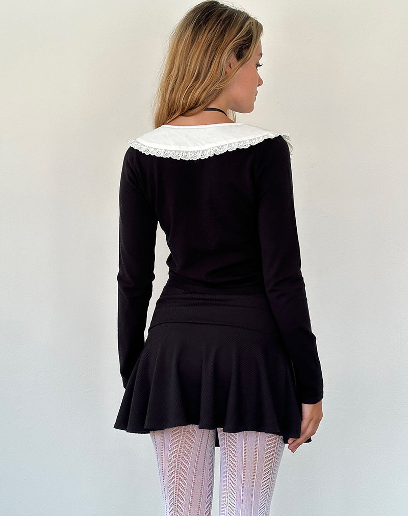 Image de Jodine Cardigan en tricot noir à volants blancs