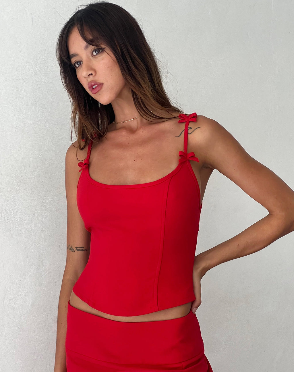 Kaida - Top corseté avec nœud, rouge tailleur