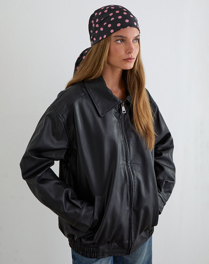 Image du foulard Kavra en satin noir parsemé de pois roses