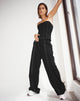 image du pantalon Albus en noir avec couture blanche