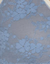 Maille bleue et reliure ivoire