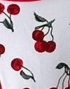 Cerises avec reliure contrastée