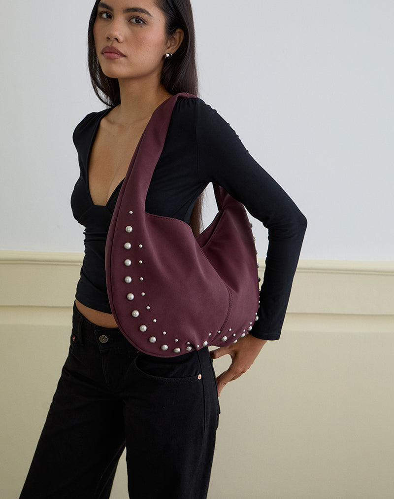 Image de la pochette cloutée en bourgogne