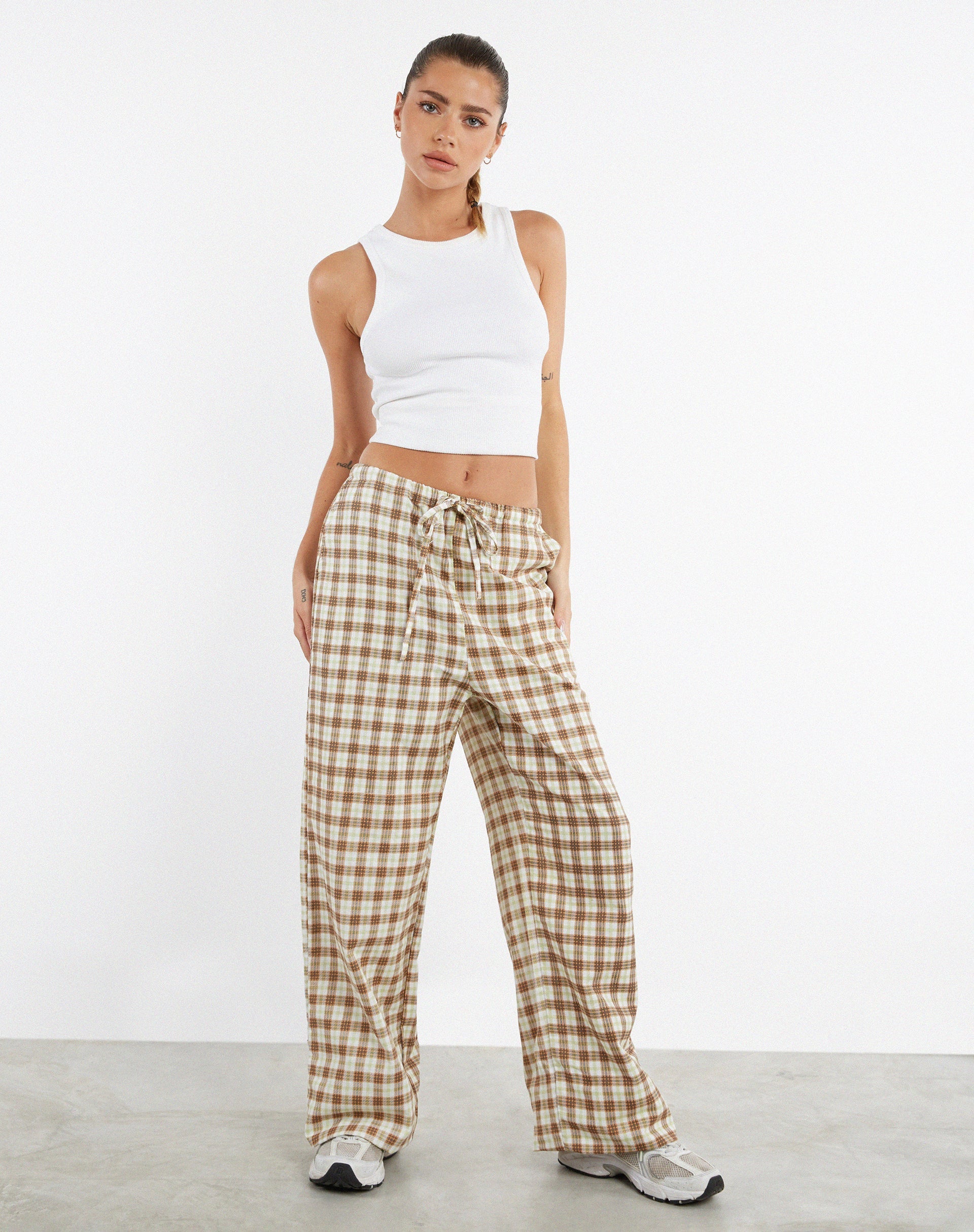 Image de MOTEL X JACQUIE Pantalon large Lirura à carreaux jaunes et bruns