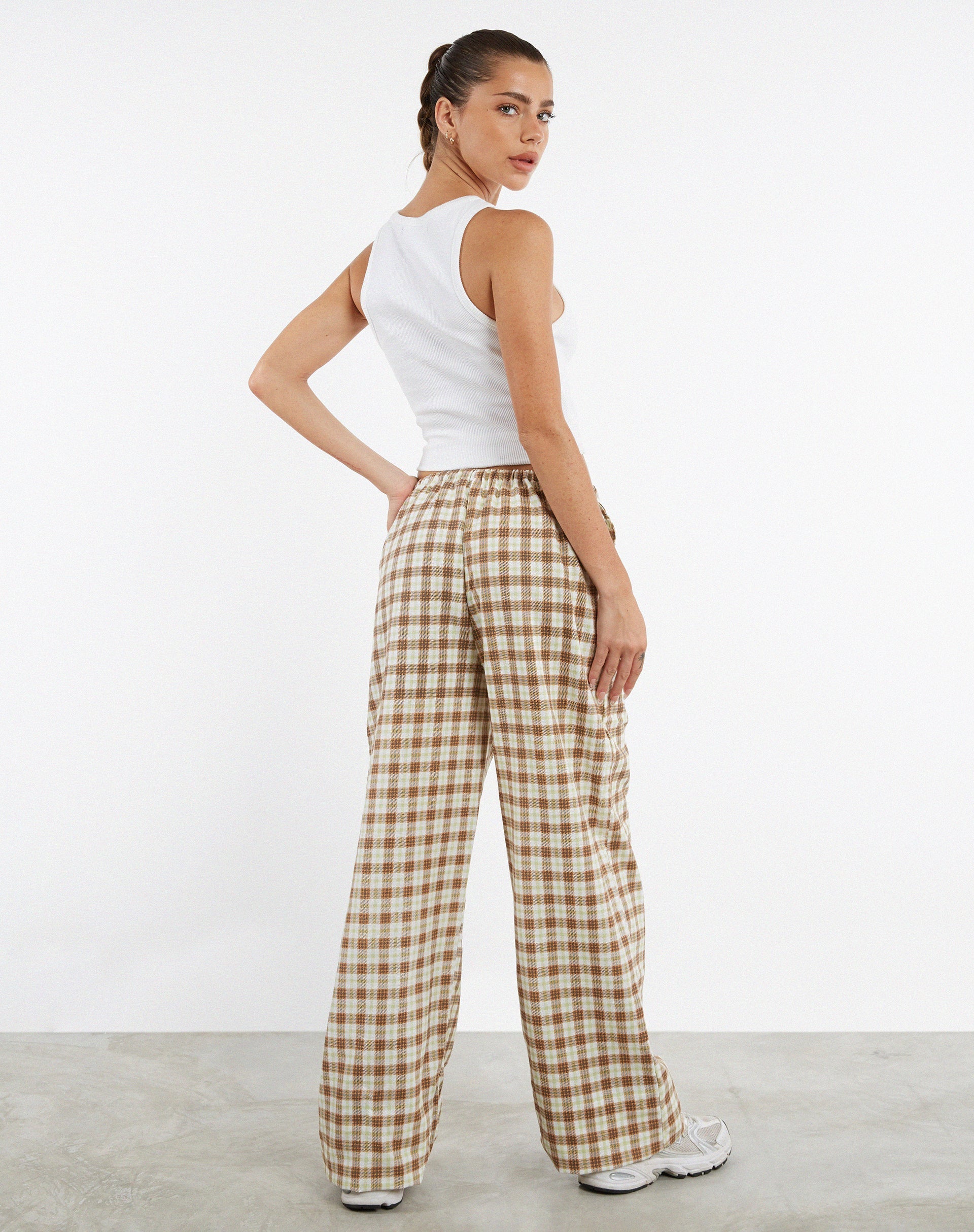 Image de MOTEL X JACQUIE Pantalon large Lirura à carreaux jaunes et bruns