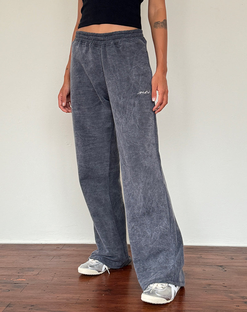 Jogger ample en noir délavé avec broderie 'MOTEL' en blanc cassé