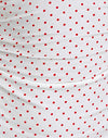 Blanc avec imprimé micro-polka rouge
