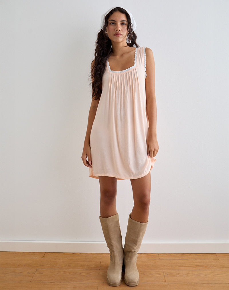 Image de Musta Mini robe sans manches en coquille festonnée
