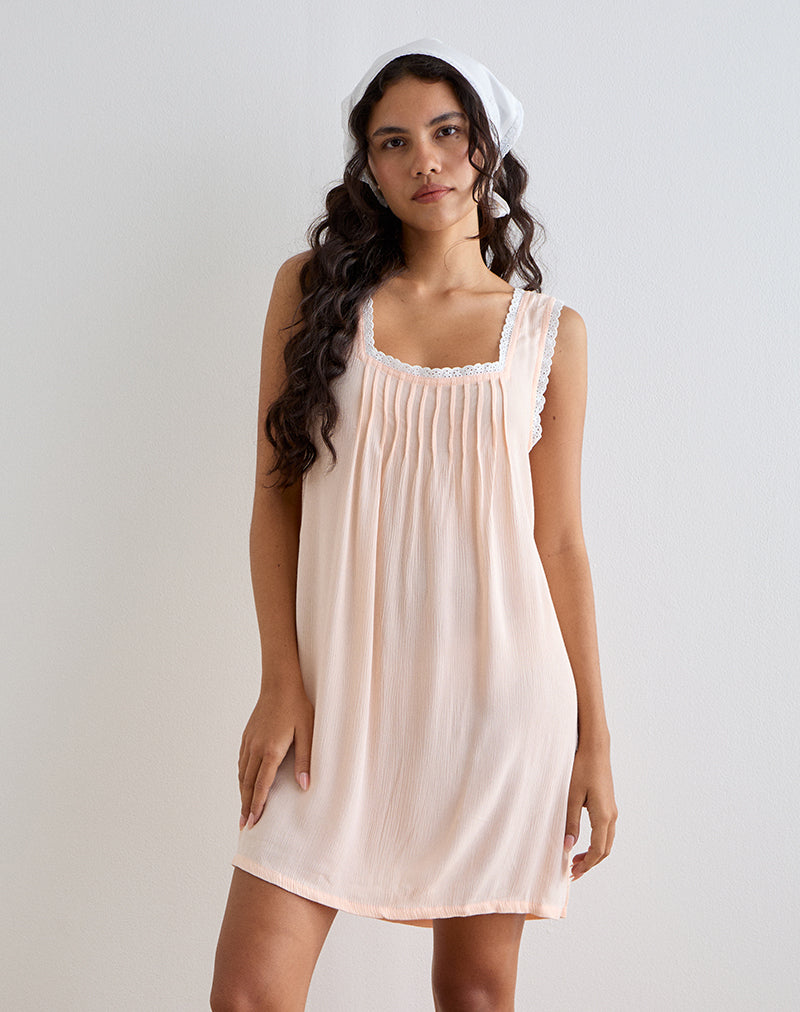 Image de Musta Mini robe sans manches en coquille festonnée