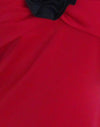Rouge avec rosette noire