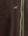 Chocolat amer avec reliure verte et embellissement M