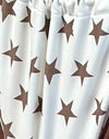 Impression d'étoiles blanches et brunes avec reliure contrastée