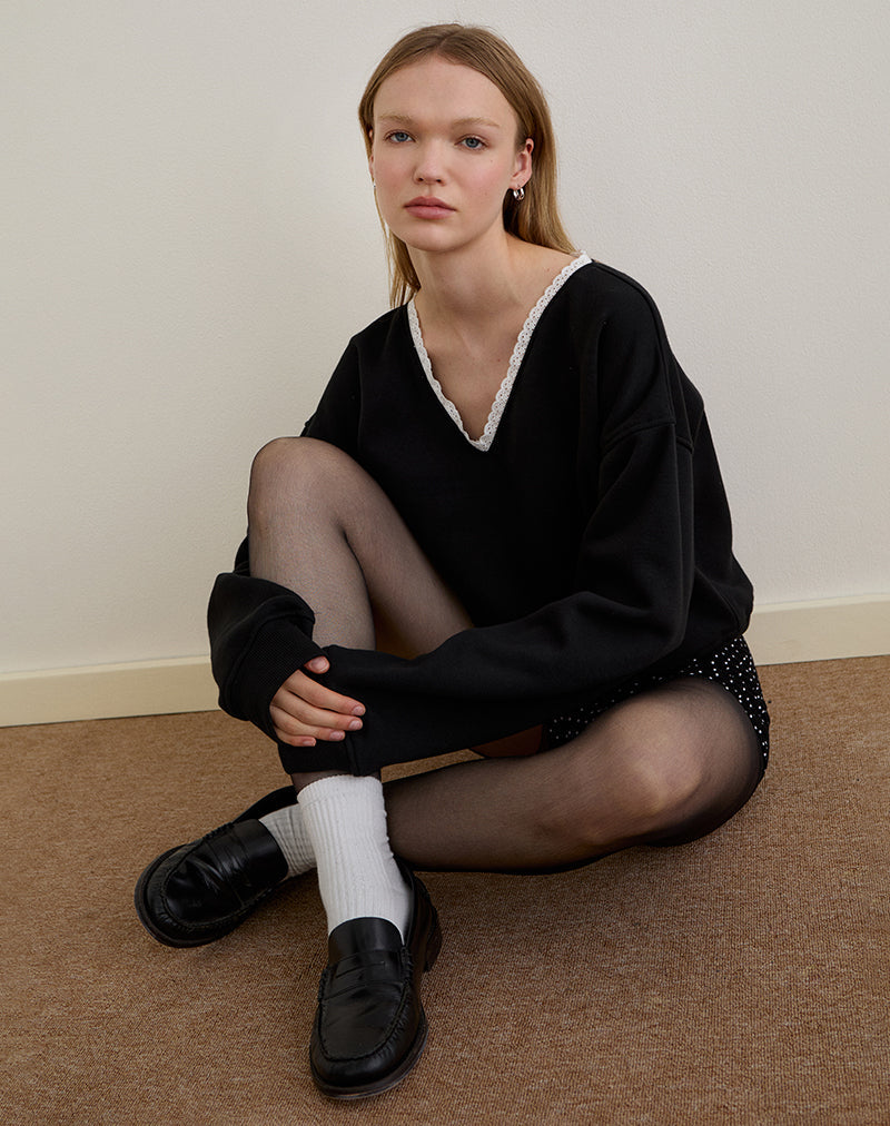 Pull Rodyn en noir avec des pointillés blancs