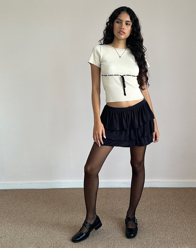 Image de Sabine Top en beige avec reliure noire