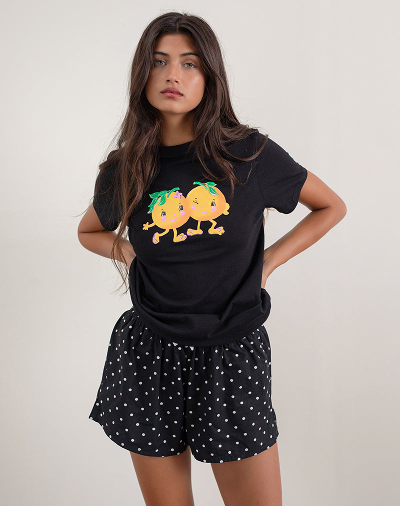 Image de Saki Tee en noir avec imprimé Squeeze Me Orange