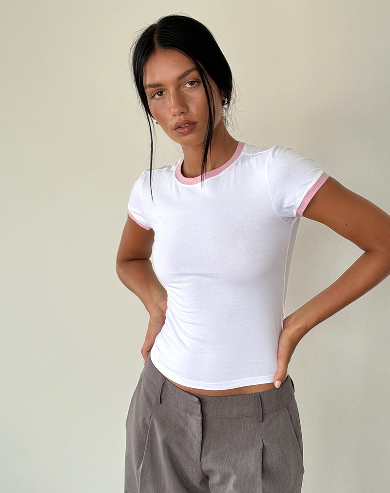 Top Salida en blanc avec reliure rose flamant