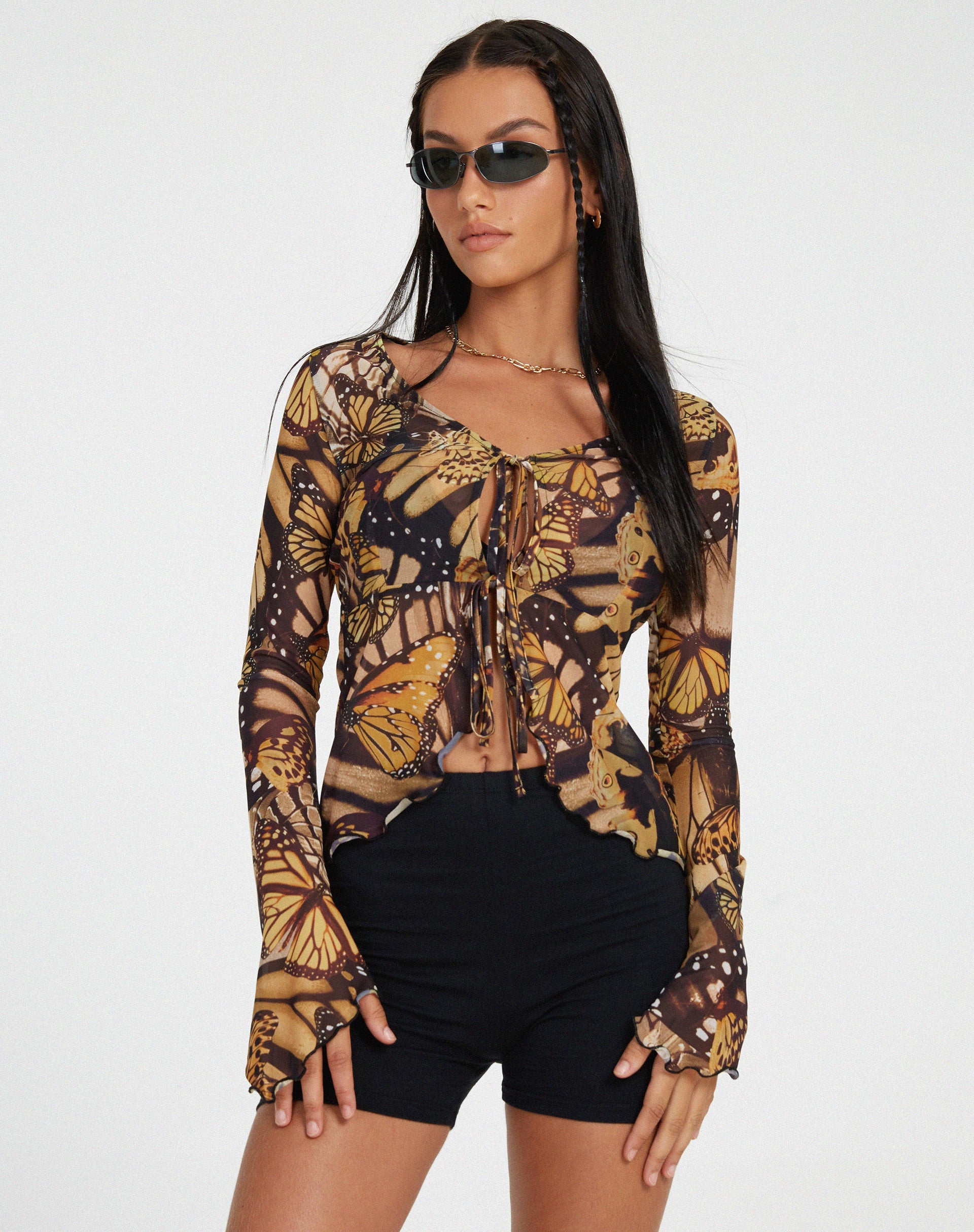 image de Sansa Cardi en or papillon