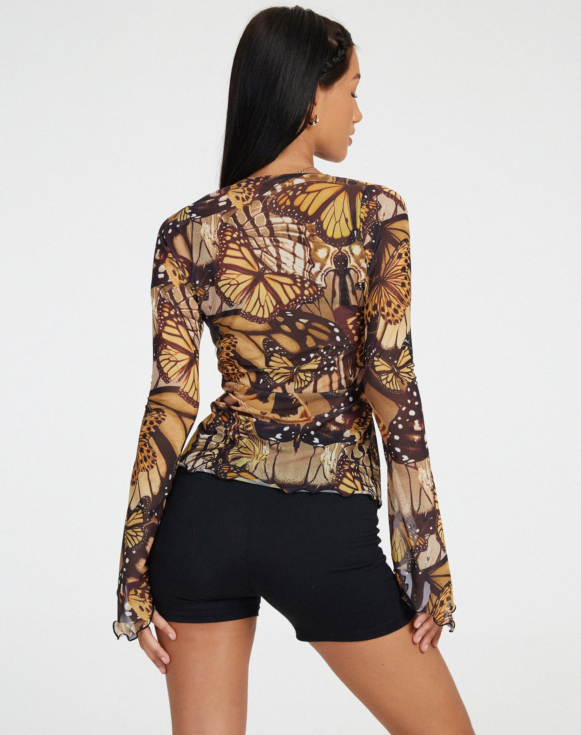 image de Sansa Cardi en or papillon