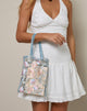 Image du sac Shi en broderie de dentelle naturelle avec reliure en satin bleu