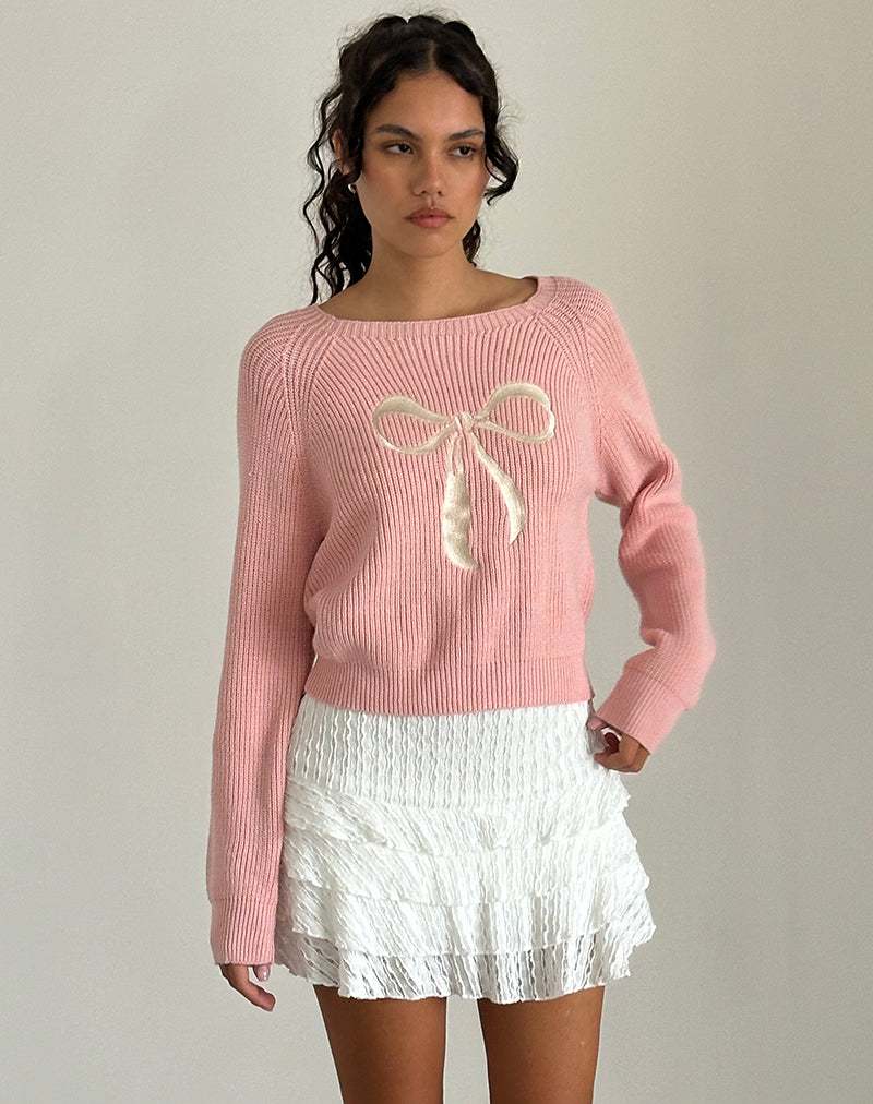 Pull Tami en tricot rose avec broderie de nœuds blancs