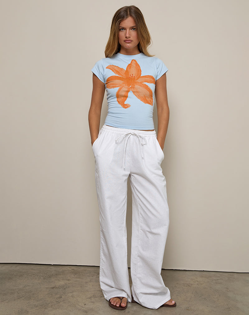 Image de Tiona Tee en bleu avec fleur peinte orange